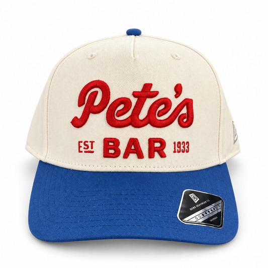 Pete's Bar cream red blue brim hat, front view