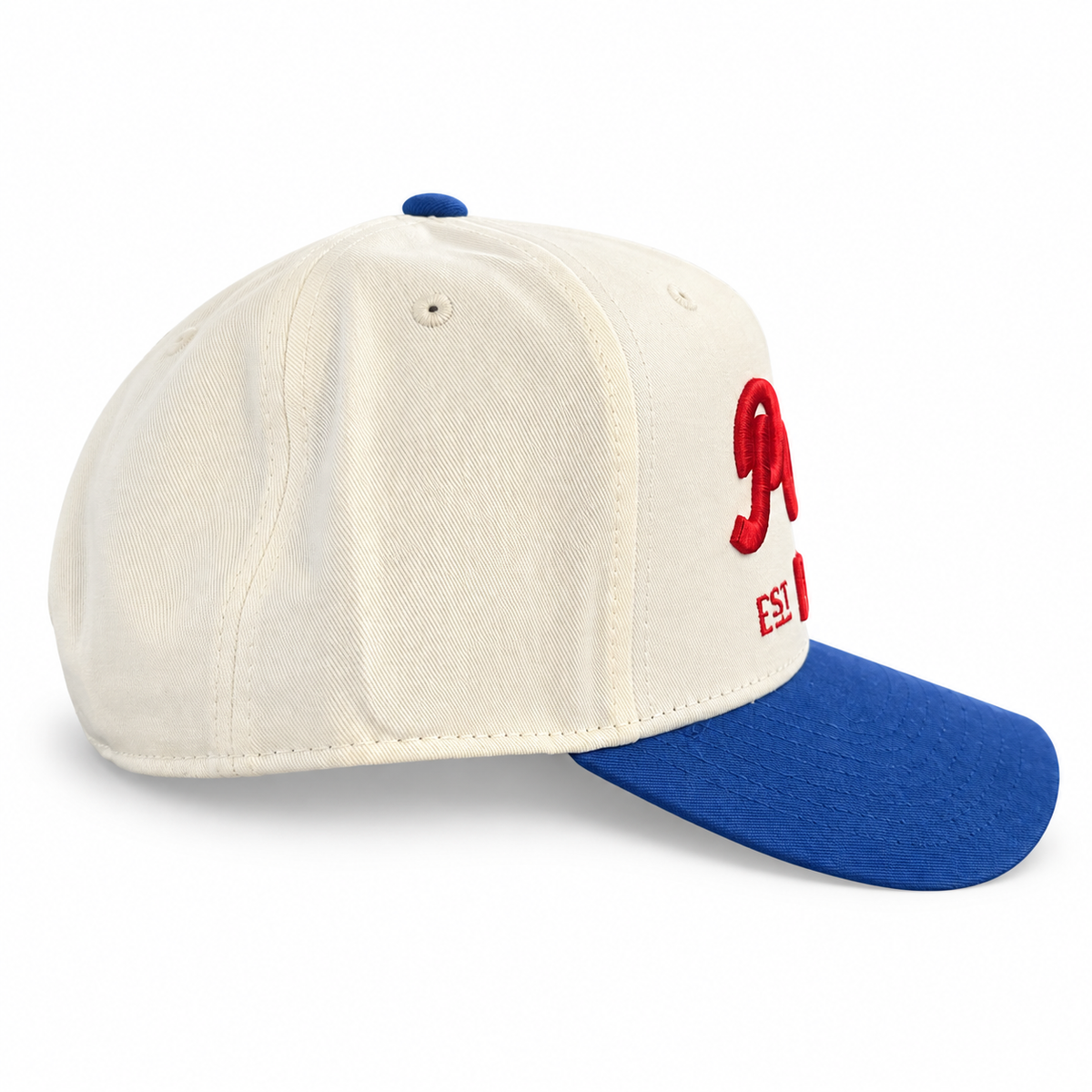 Pete's Bar cream red blue brim hat, side view